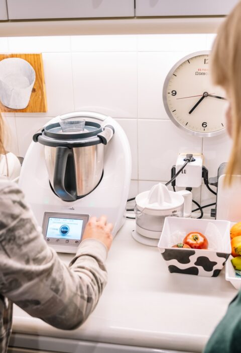 Barcelona, Spain, 15 January, 2021: Two women using thermomix at home