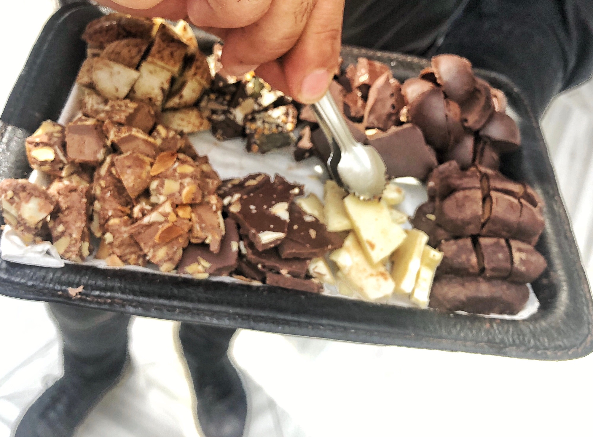 Chocolate Chocolatier giving away free samples of organic chocolate at a new local store