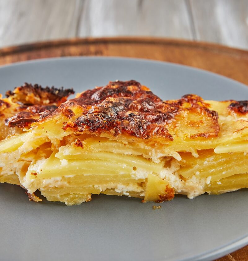 French recipe gratin on plate.French gourmet cuisine