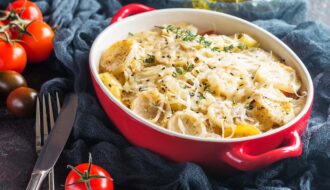 Potato gratin, in rustic dish.