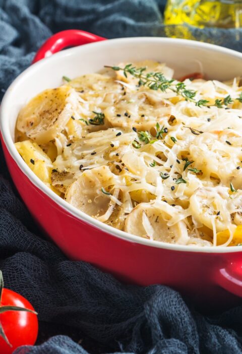Potato gratin, in rustic dish.