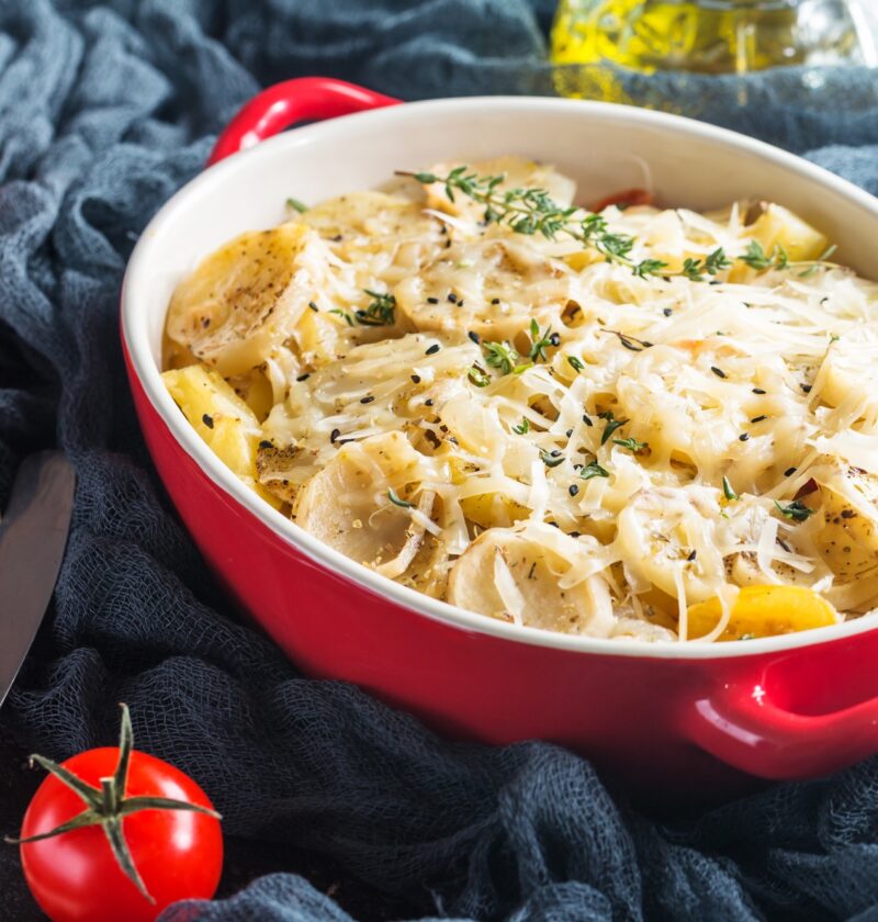 Potato gratin, in rustic dish.
