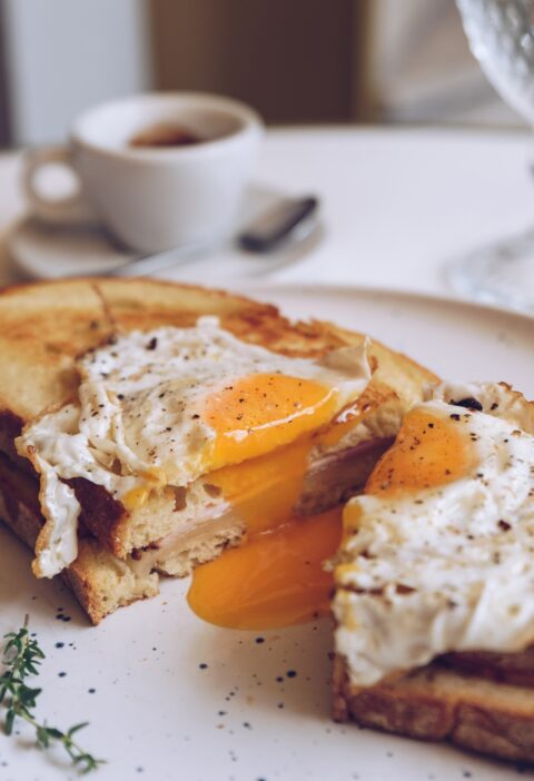 Croque madame, french toast with poached egg, ham and cheese